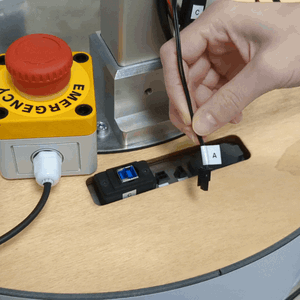 Plug stop button